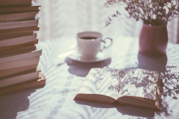 The Blended family devotional- A cup of coffee by a pile of books