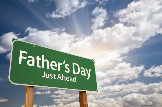 The history of father's day - road sign that says Father's Day Just Ahead