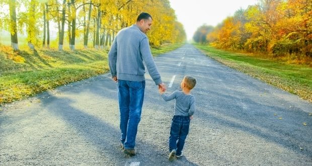 should a child call his stepdad ''daddy?''- Stepdad and stepson taking a walk