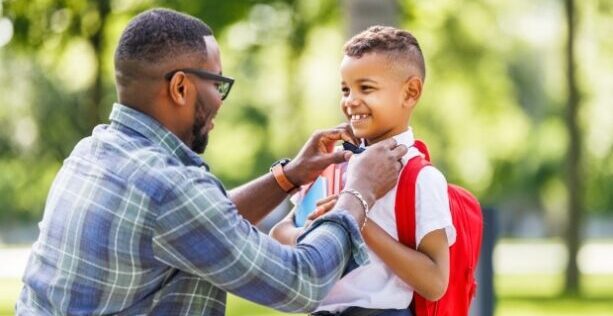 How stepdads can take the lead - A stepdad dropping off his stepson in school