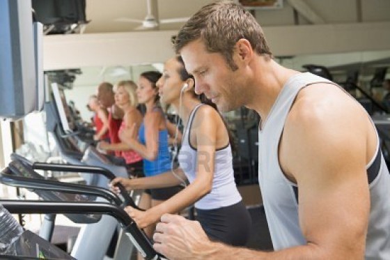 Man Running on Treadmill at Gym