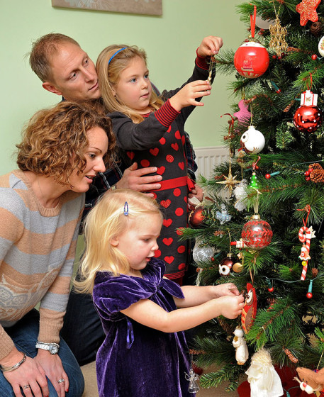 Santa Claus - Family Decorating Christmas Tree