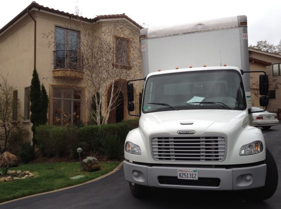 Safe - Moving van in front of a new home