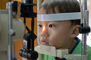 glasses - child taking eye exam