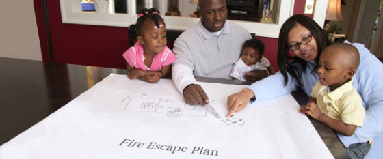 safe - family reviewing fire escape plan