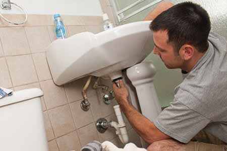 Dad working on plumbing