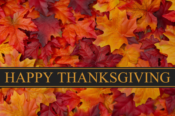 Happy Thanksgiving Greeting, Fall Leaves Background and text Happy Thanksgiving