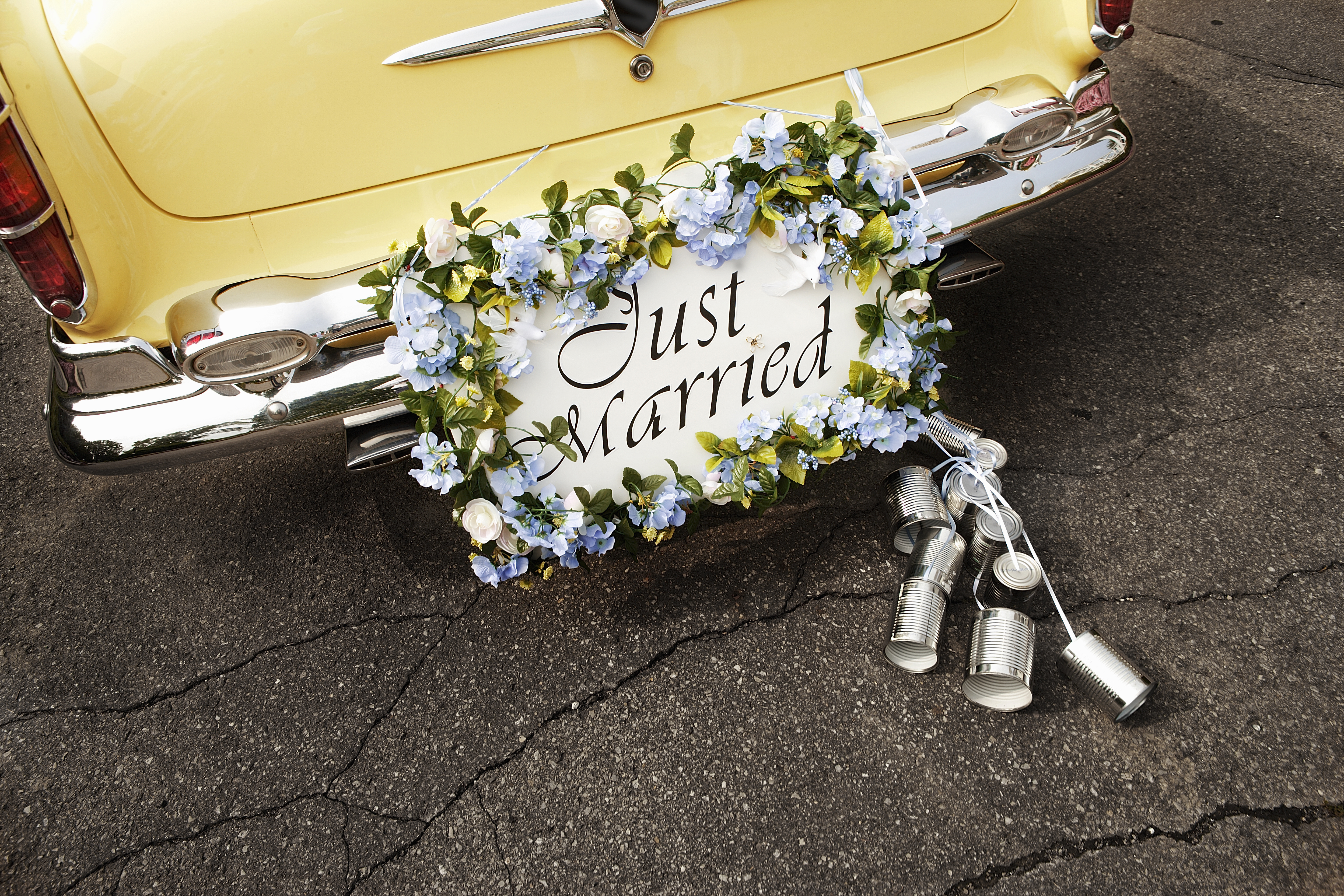 just married sign on bumper of vintage car