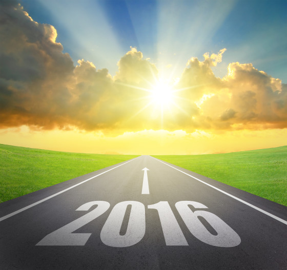 Forward to 2016 new year concept , asphalt road with arrow , date and beautiful sunset and sunshine