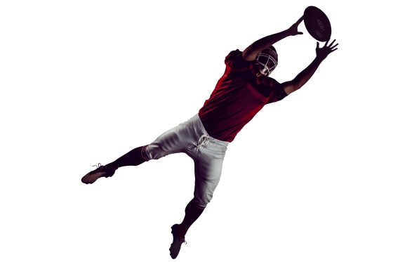 Getting air - a football player jumping into the air to catch a pass