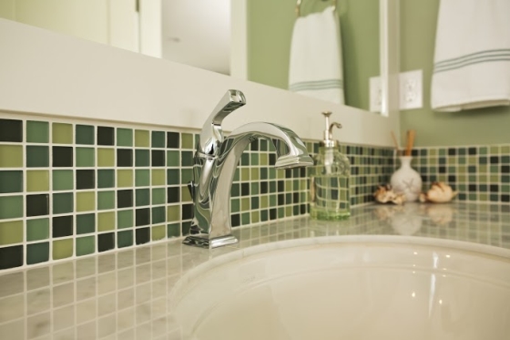 green updates add value to your real estate - picture of bathroom sink with a water conserving faucet