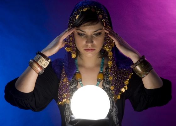 different types of psychics - clairvoyant concentrating on crystal ball