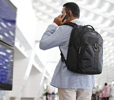 right man bag to match your personal style - business man wearing a backpack