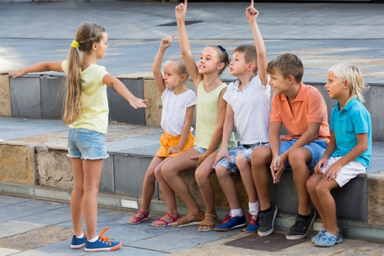 deaf friendly games for a children's party - five children playing Charades