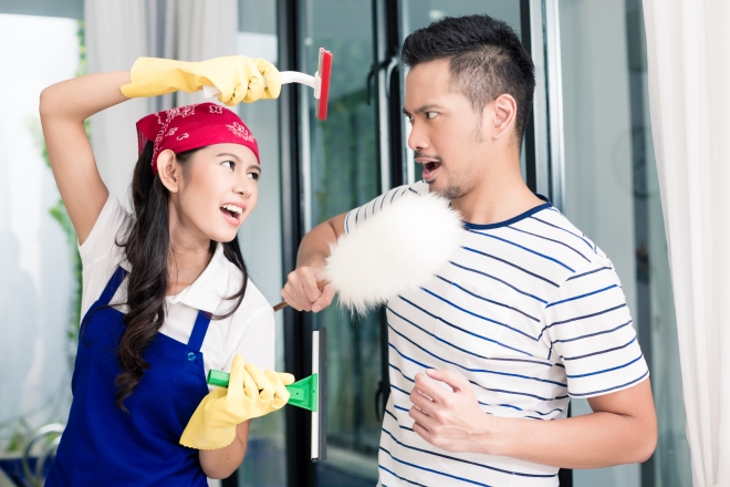 cleaning tools men will love - asian couple having fun cleaning around the house