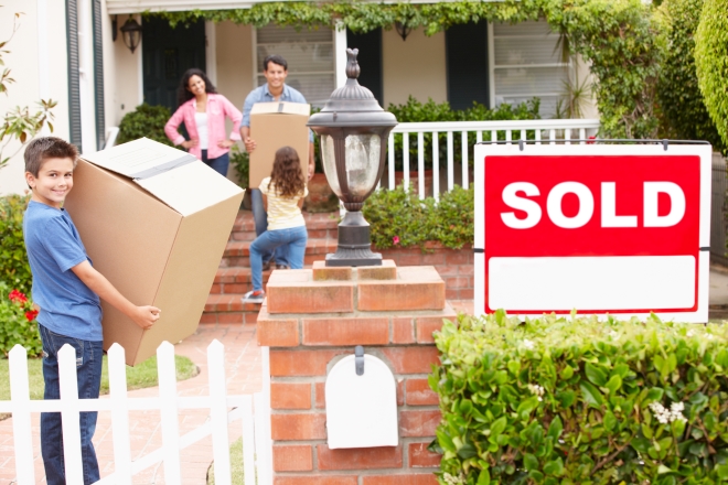 tips to make moving better for the whole family - family moving into their new home
