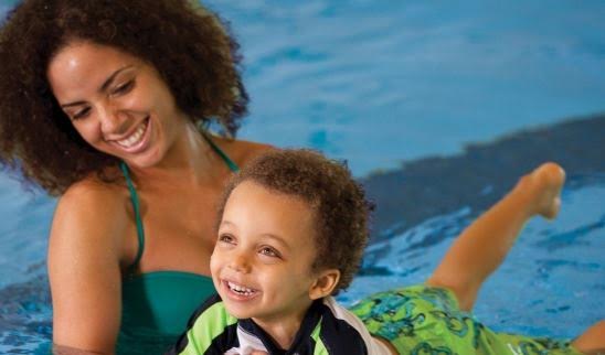 teach your children to swim safely - mother teaching son how to swim