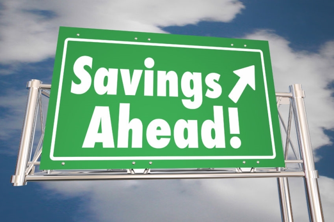 driving tactics to save fuel - road sign showing, "Savings Ahead!"