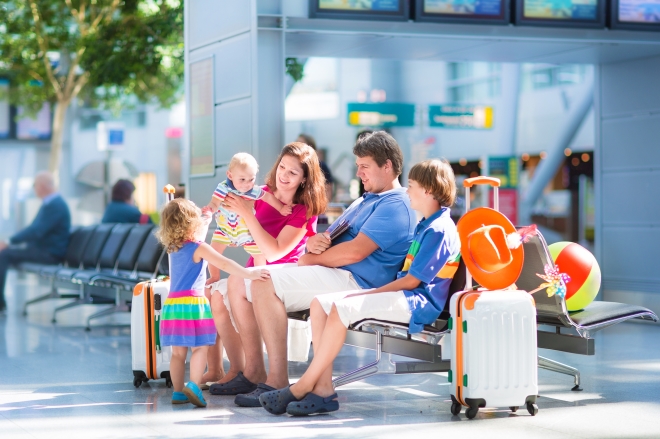 international family vacation -big family at airport