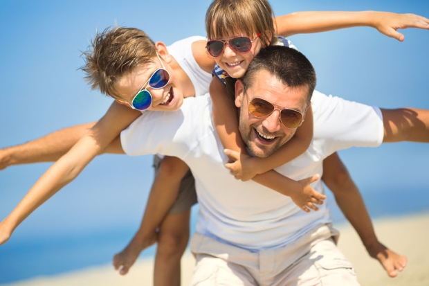 show your love and care as a stepdad - stepdad with stepkids at the beach