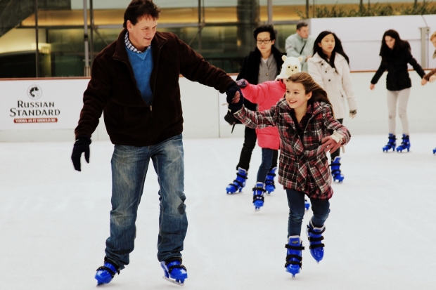 family activities you can do all year long - stepdad and stepdaughter ice skating