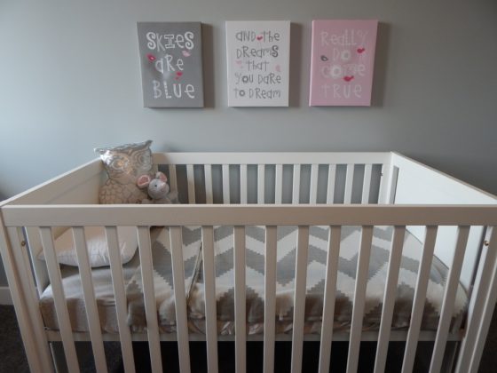 preparing a nursery - the do's and don'ts - picture of a baby's crib and three word pictures on the wall