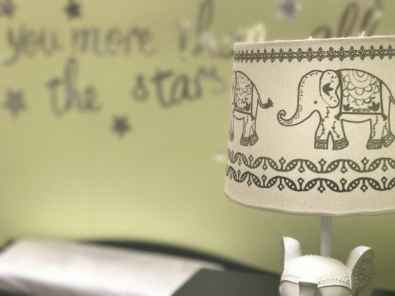 preparing a nursery - the do's and don'ts - picture of nursery light with a quote on the wall in the background