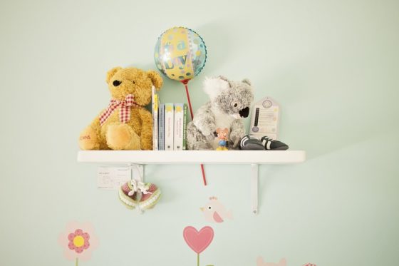 preparing a nursery - the do's and don'ts - picture of a nursery book case with several miscellaneous items