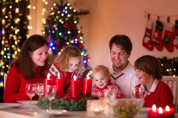 successful stepfamily christmas - blended family preparing for Christmas dinnr