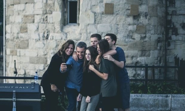 reducing family stress - stepfamily posing for a selfie