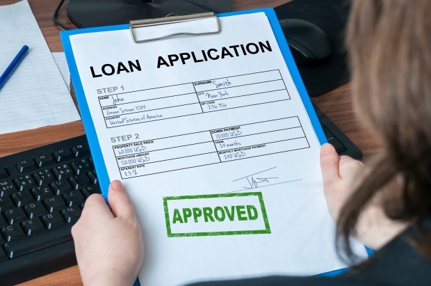 loan application form with approval stamp