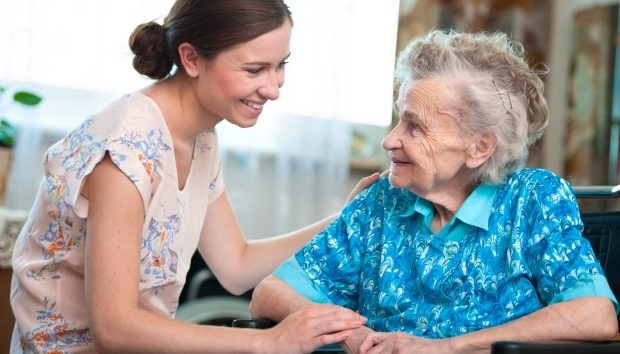 signs your parents need home care -Senior woman with home care giver