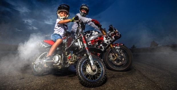 activities to help families bond - stepdad and stepson engaged in motocross