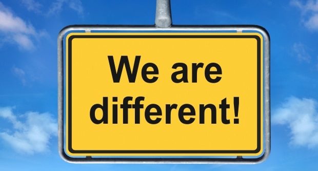 how different cultures deal with money - sign that says we are different