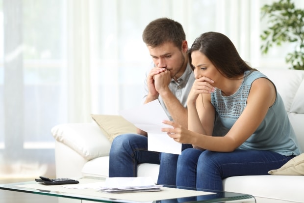 Young Couple Troubled by Debt