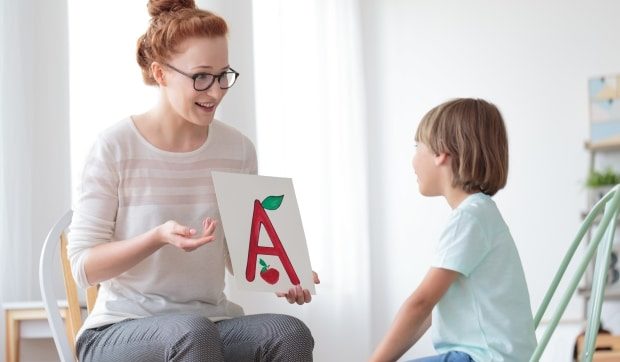 A child may need a speech pathologist anywhere between the age of 18 months to 3 years if the normal speaking and talking abilities are delayed or barred - friendly speech therapist and student