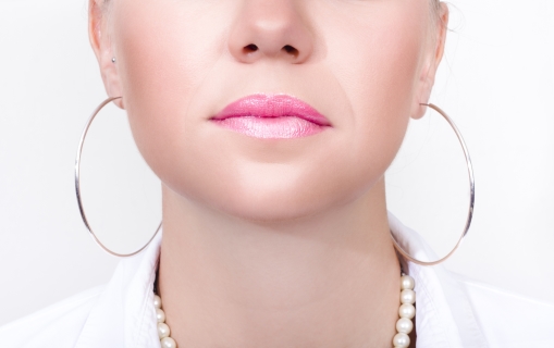 Picking Earrings For Your lady's Face Shape -Closeup Beauty Photo Of Shiny Pink Lipstick