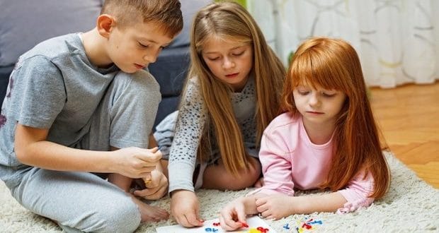 how to handle sibling rivalry-siblings playing a game