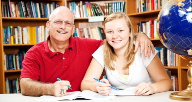 Ways To Help Your Kids Prepare For College - stepdad help stepdaughter with her studies