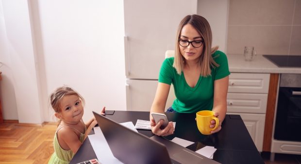 single mom reviewing budget and finances
