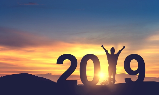 silhouette of young woman Enjoying on the hill and 2019 years while celebrating 2019