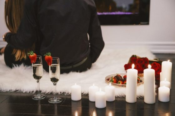 affordable valentine's day date night ideas-a couple having an intimate dinner