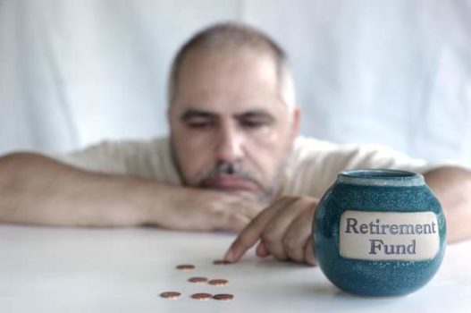 retirement savings- man planning retirement funds