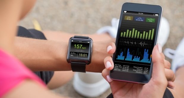 mobile phone connected to fitness tracker