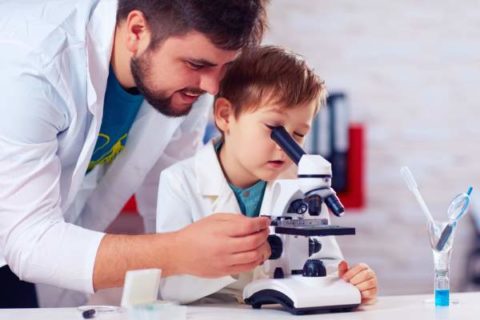 ways to encourage STEM education for kids-a man teaching a boy