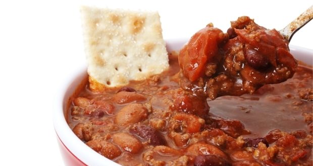 bowl of chili with a cracker