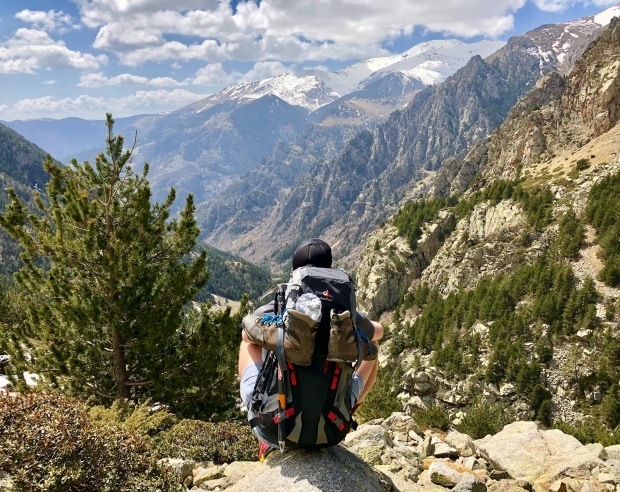 hiking risks to be aware of - hiker overlooking valley