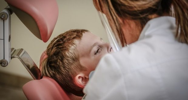 youth being treated for a dental emergency