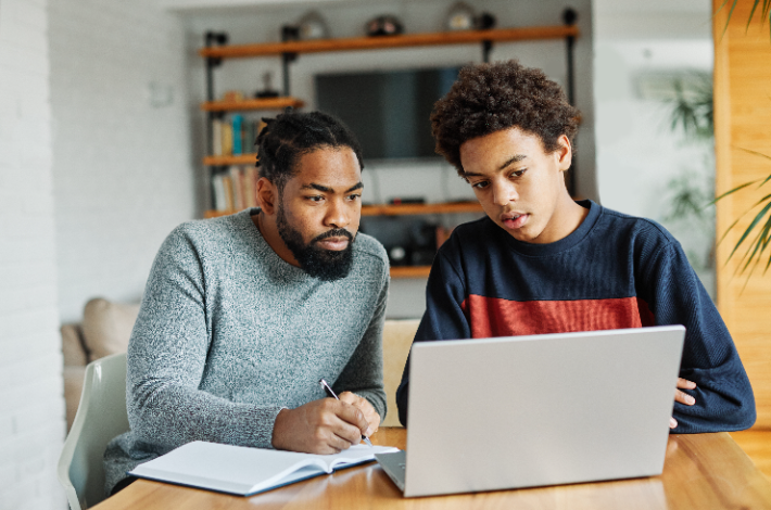 Time management and improving grades - dad helping son study