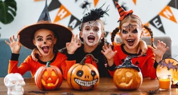 Halloween traditions to start with your kids-kids dressed in Halloween costume